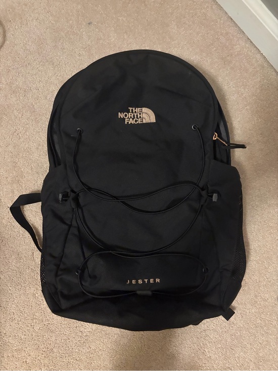 The North Face Handbags - The North Face Black Jester Backpack with Gold Logo
